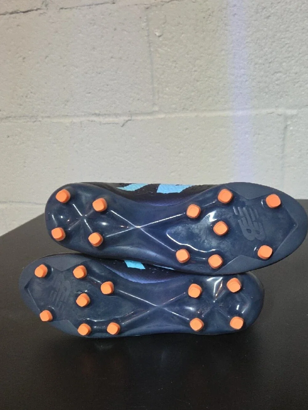 New Balance Men’s Navy Soccer Cleats with Light Blue Logo and Orange Studs